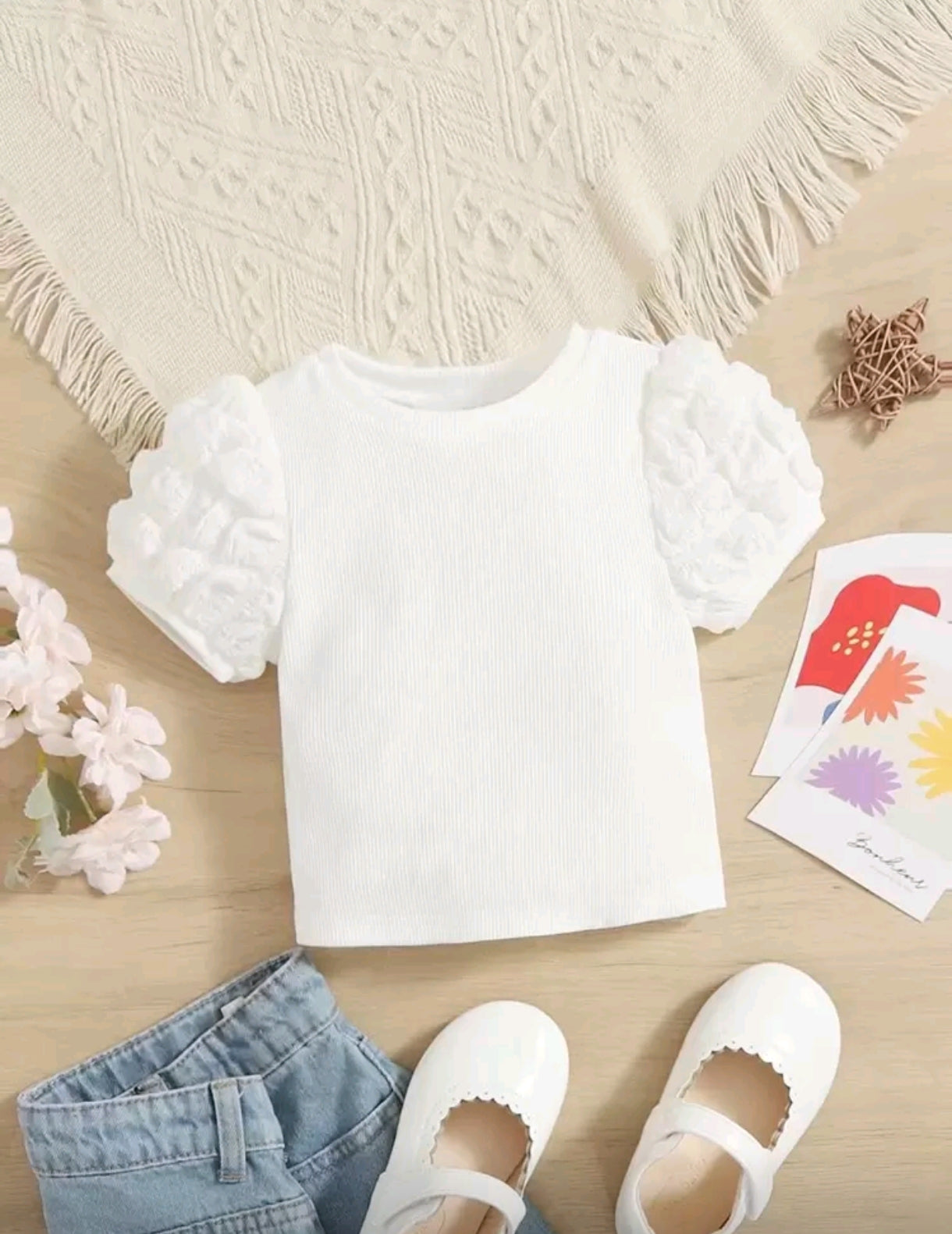 Blusa bebé de mangas abullonadas