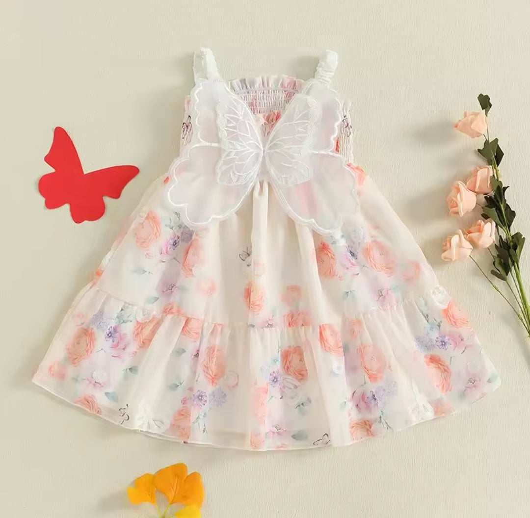 Vestido floral con detalles en alitas