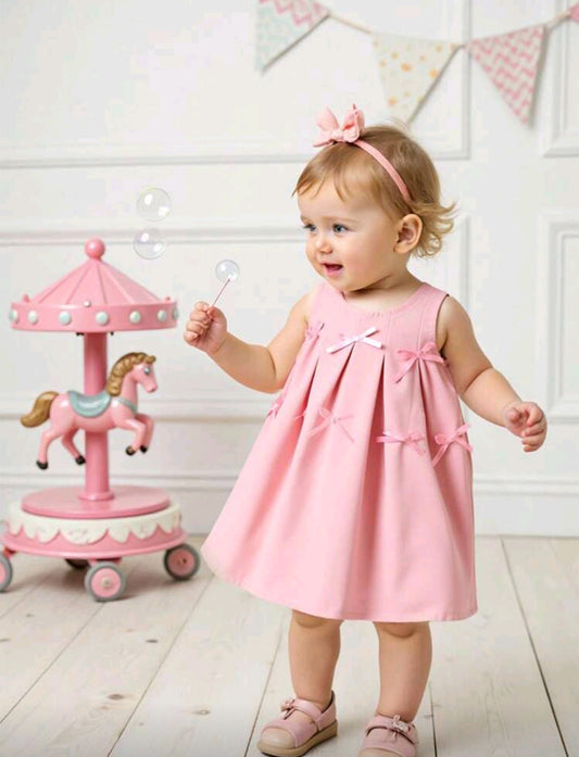 Vestido bebé sin mangas con detalles en moño
