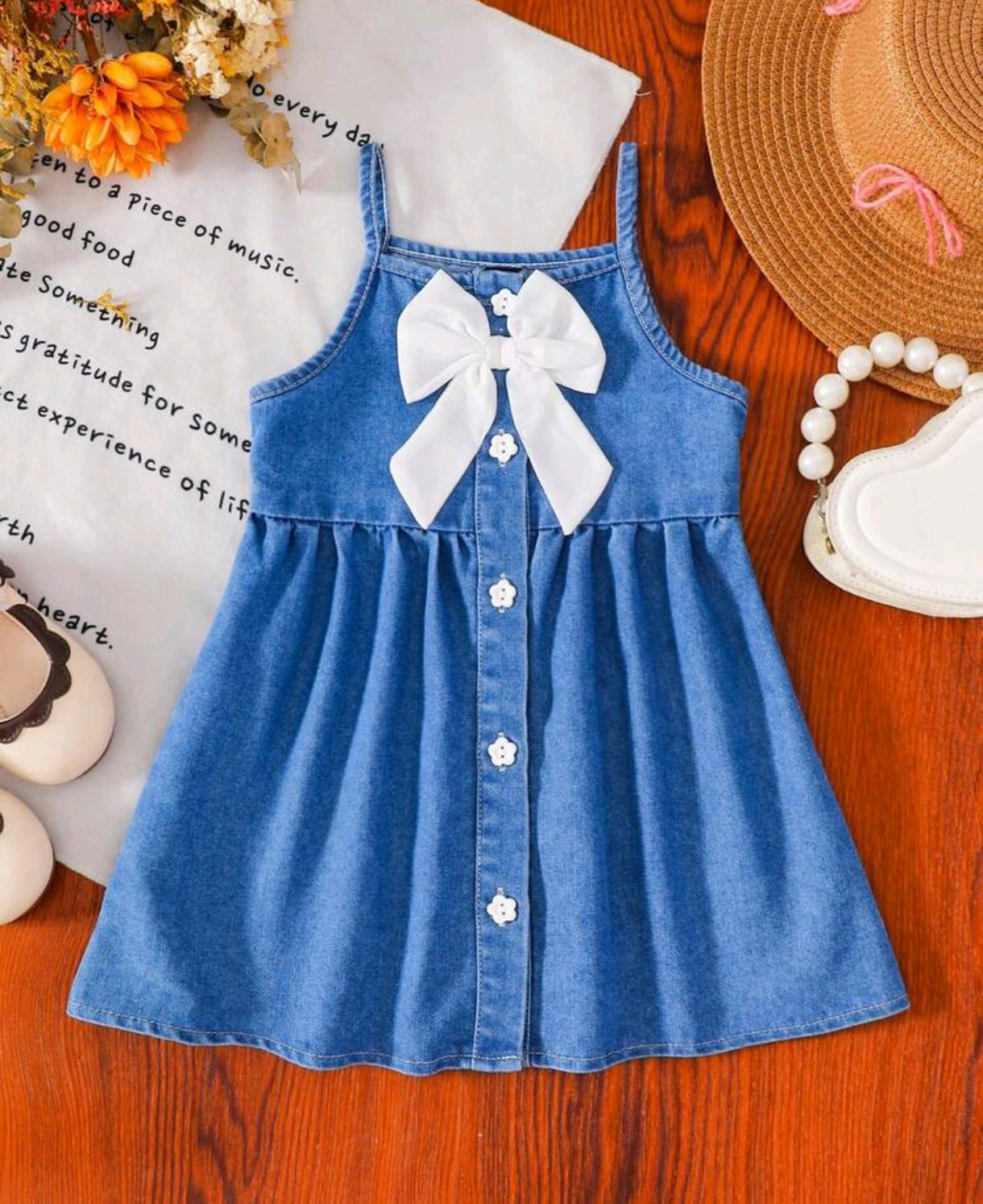 Vestido sin mangas de jeans para bebé con moño frontal