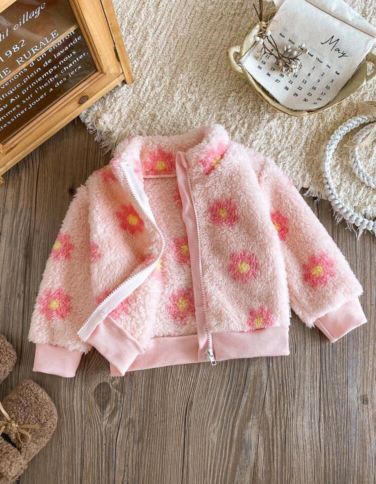 Abrigo con cierre y con estampa floral