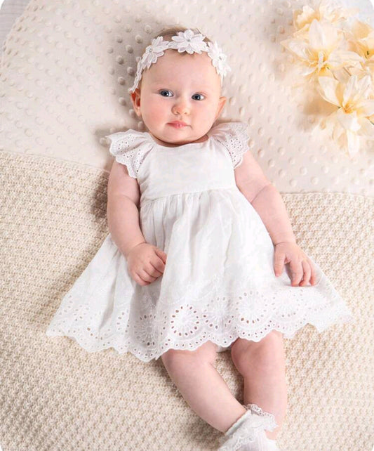 Vestido blanco bebé con detalles en broderie