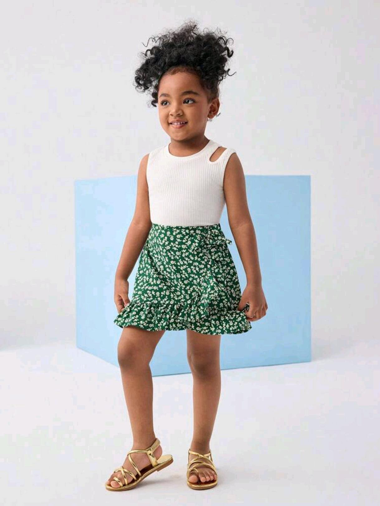 Blusa sin mangas + falda estampado