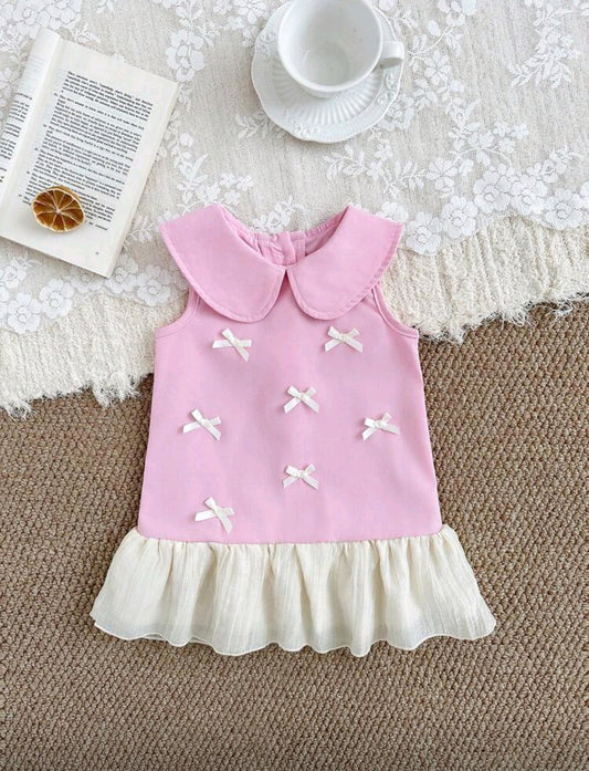 Vestido bebé chic con detalles en moño