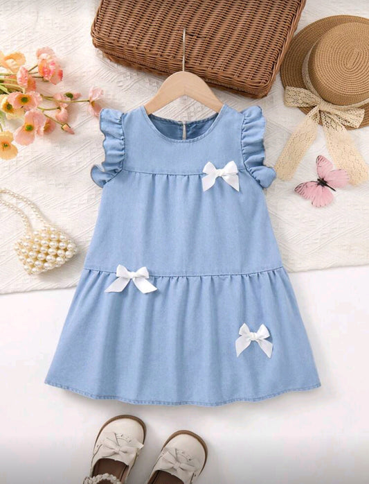 Vestido de jeans con detalles en moños