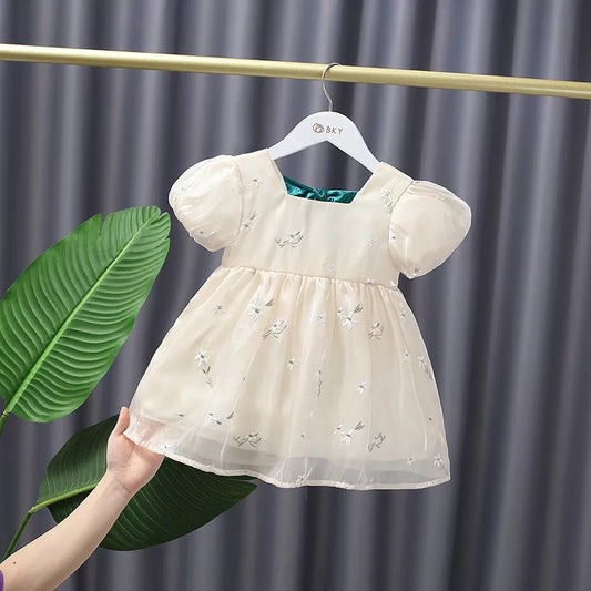 Vestido con brillo y lazo verde